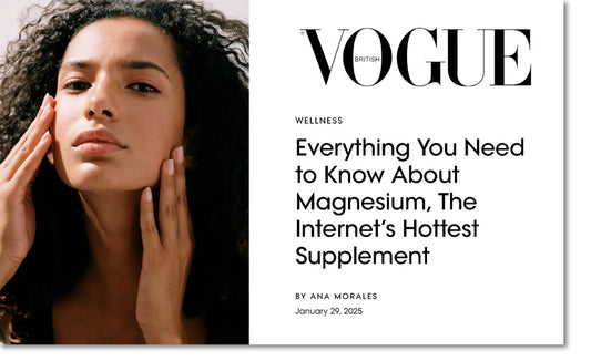 Vogue cover of a woman touching her face