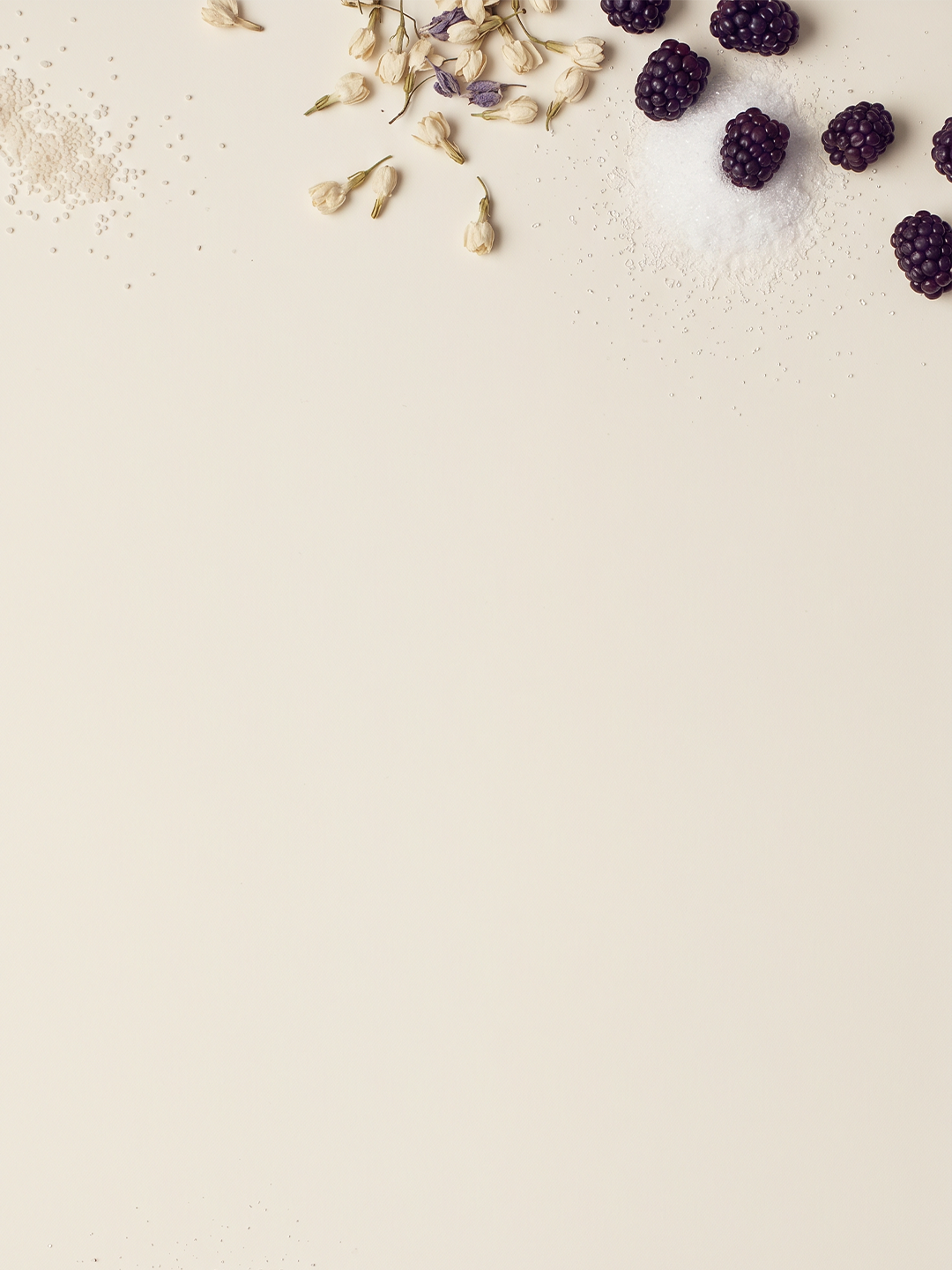 Flat-lay of AVRO ingredients on a cream surface
