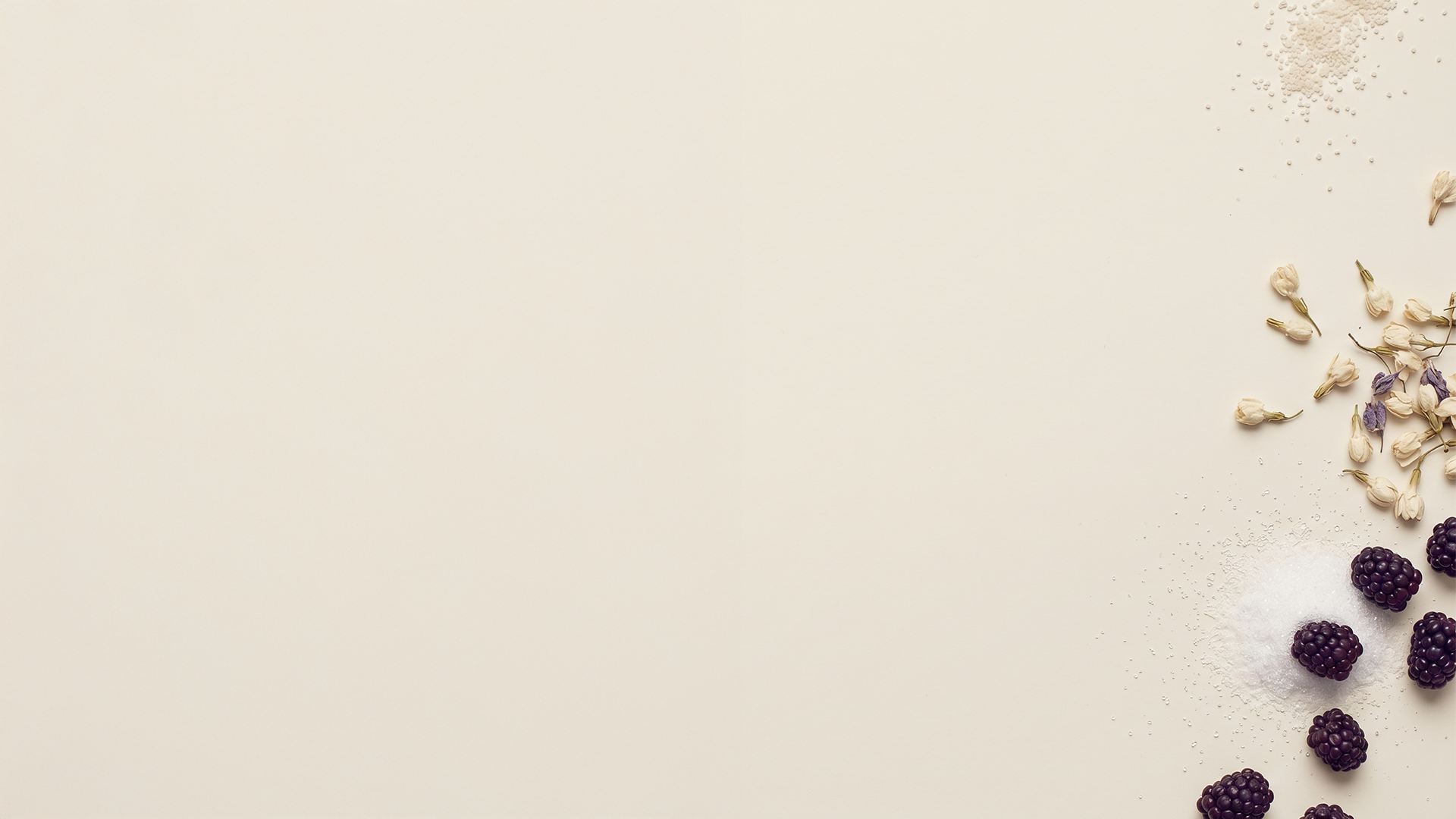 Flat-lay of AVRO ingredients on a cream surface